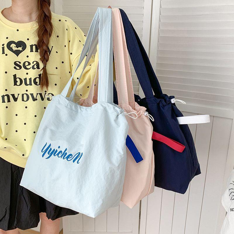 Dopamine Color Drawstring Canvas Shoulder Bag – Korean Lazy Style Large Tote for School & Commute