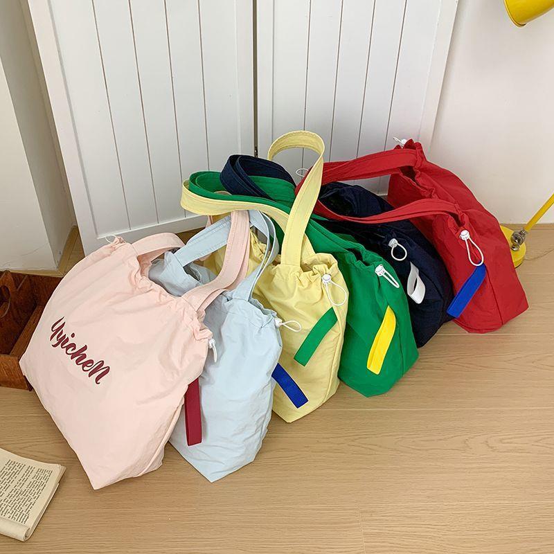 Dopamine Color Drawstring Canvas Shoulder Bag – Korean Lazy Style Large Tote for School & Commute